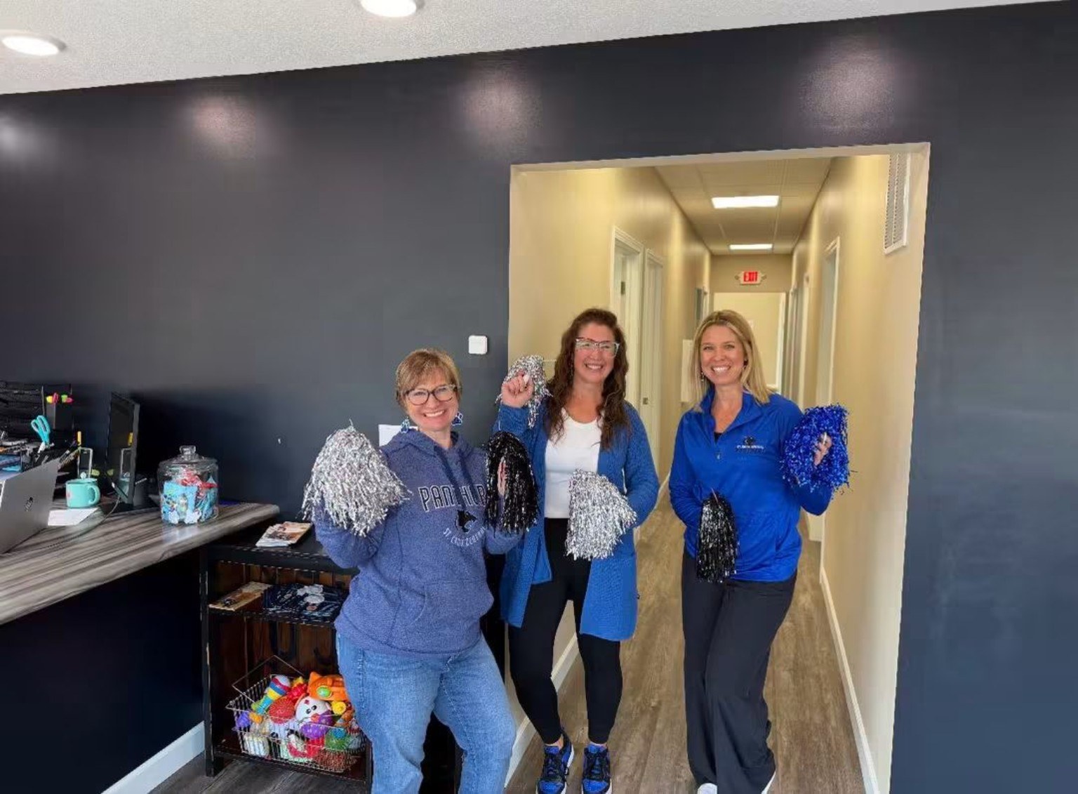 Sensible Solutions Care Clinic team gathered together in a clinic hallway