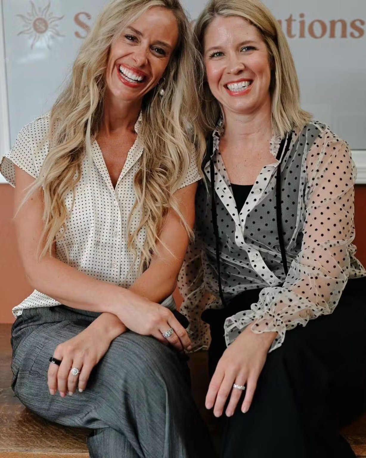 Katie with a colleague, smiling together